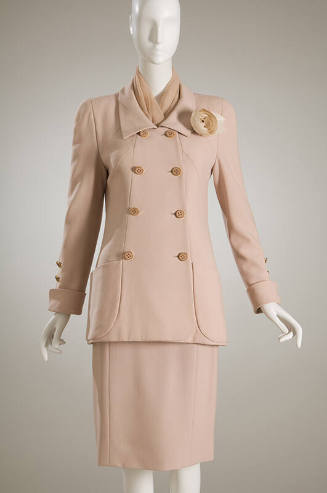 pale rose double breasted jacket, matching skirt, and artificial rose on collar