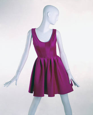Neon pink short skating tank style dress with scoop neck and flared skirt