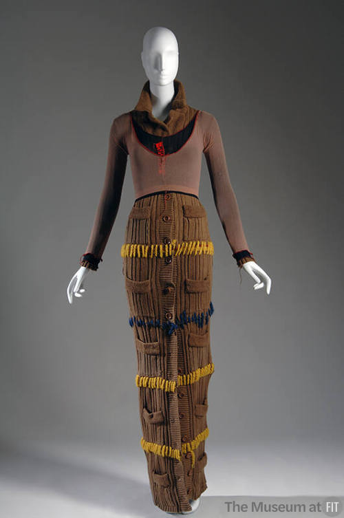 Brown full length cardigan sweater dress with yellow and blue yarn, two long sleeved crop tops …
