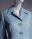 Light blue wool suit; large Medusa logo buttons
