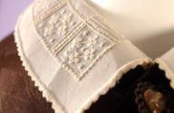 Detail of ivory collar with floral stamp pattern