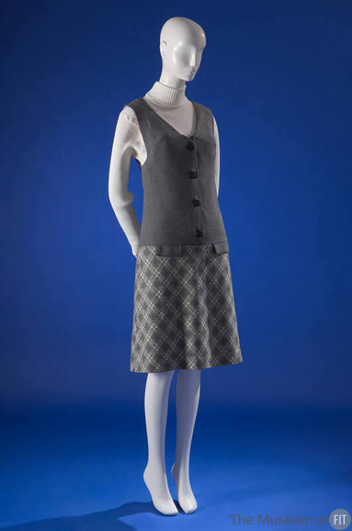 Drop-waist jumper grey dress with V-neck bodice and grey & white argyle knit A-line skirt 