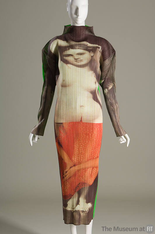 Ankle length long sleeve pleated column dress with beige, brown and orange print of neoclassic …