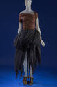 Brown sequined top with single right sleeve, black gathered pouf skirt with asymmetrical hem an…