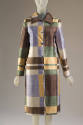 Button front coat in brown, gold, cream, green, and blue-violet irregular plaid print
