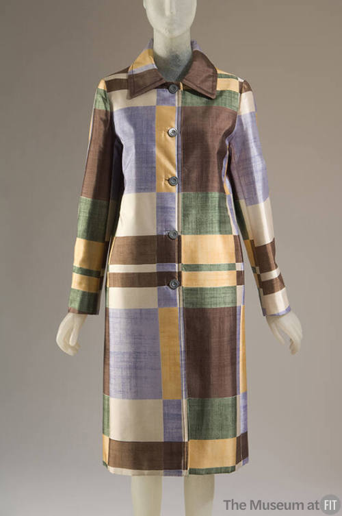 Button front coat in brown, gold, cream, green, and blue-violet irregular plaid print