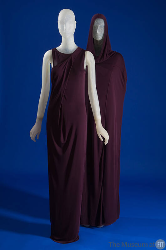 Purple floor length sleeveless evening gown with cross over effect bodice and separate matching…