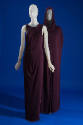 Purple floor length sleeveless evening gown with cross over effect bodice and separate matching…