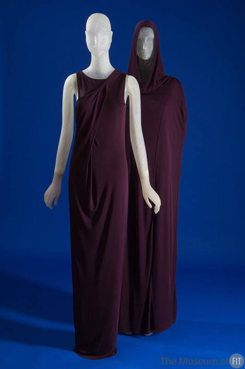 Purple floor length sleeveless evening gown with cross over effect bodice and separate matching…
