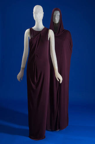 Purple floor length sleeveless evening gown with cross over effect bodice and separate matching…
