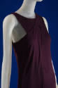 Detail view of purple dress bodice showing asymmetrical drape and underbodice panel on left sho…