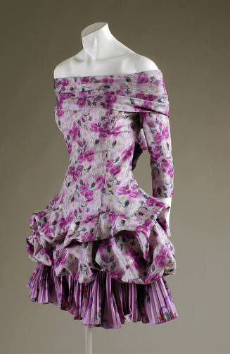 Purple floral off-the-shoulder mini dress with ¾ sleeves and pouf skirt over pleated flounce