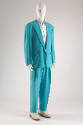 Man’s turquoise suit with single breasted jacket, tapered pants, white shirt with blue stripes …