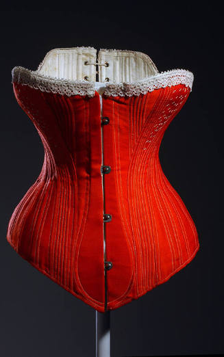Red corset with white lace trim at top, white topstitching and metal bar and loop front closure…