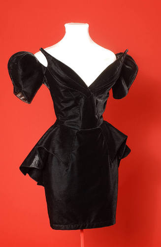 Black velvet mini dress with puff sleeves and peplum