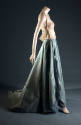 White halter neck bustier with beads over blue taffeta floor length skirt with train 