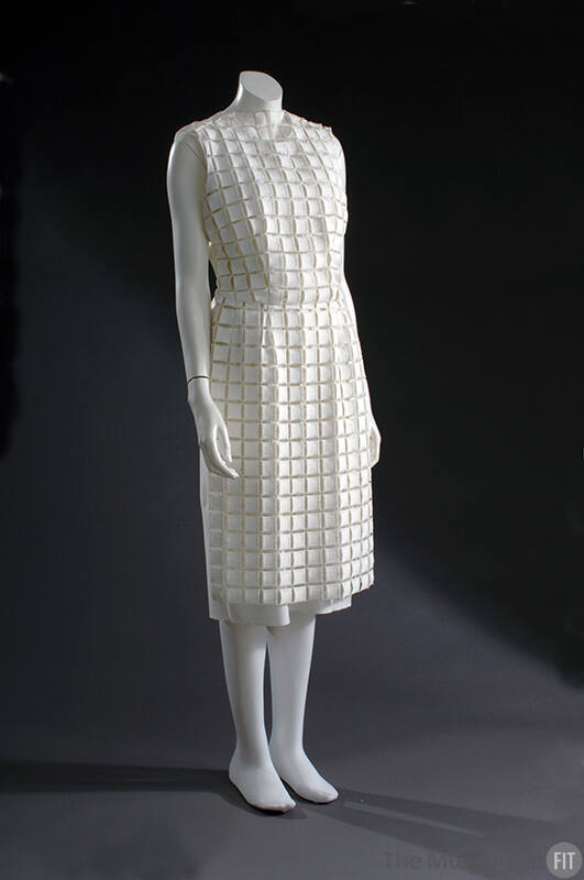 White sleeveless sheath dress of openwork squares 
