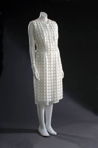 White sleeveless sheath dress of openwork squares 