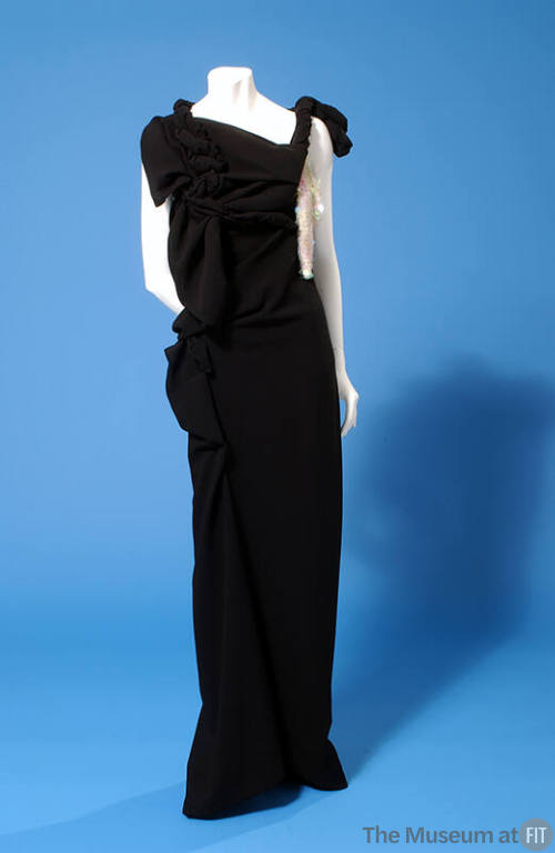 Black sleeveless floor length dress, twisted sections and shoulder ties, iridescent beaded swat…