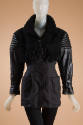 Black long sleeve leather, suede and wool jacket with fur collar and fringe