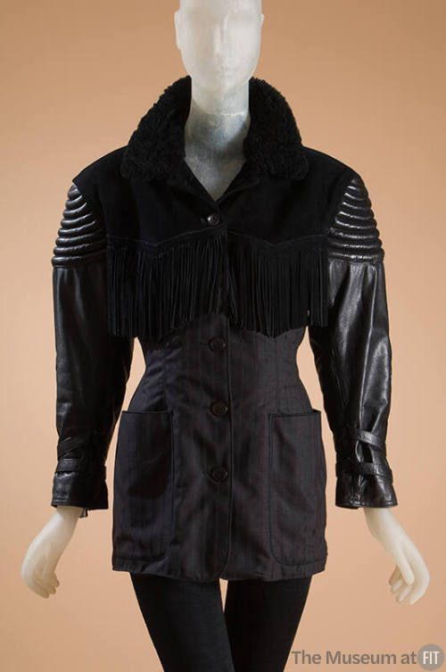 Black long sleeve leather, suede and wool jacket with fur collar and fringe