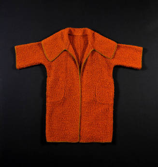Orange nubby wool jacket with 3/4 sleeves and tan leather piping