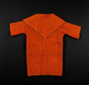 Back view of orange nubby wool jacket with 3/4 sleeves and tan leather piping