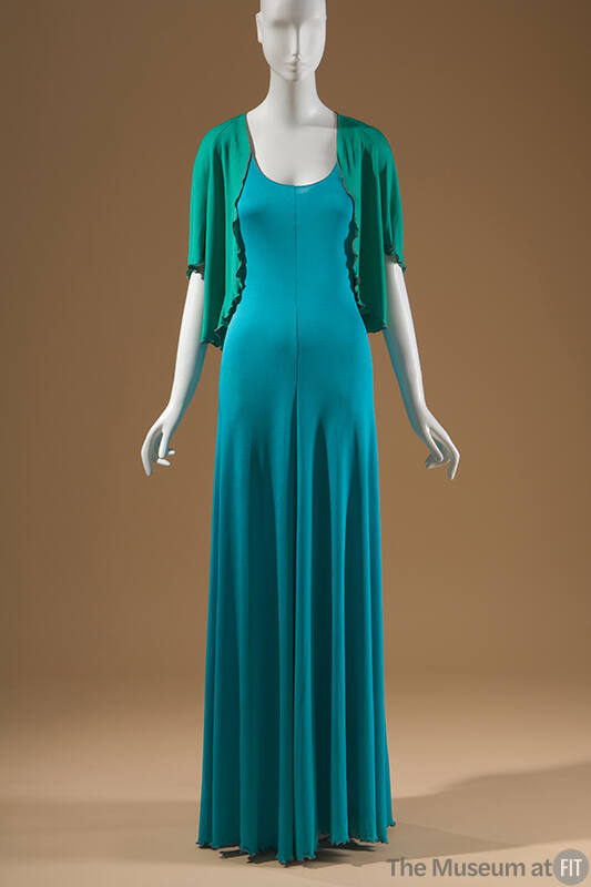 Green short sleeve jacket and blue floor length dress 