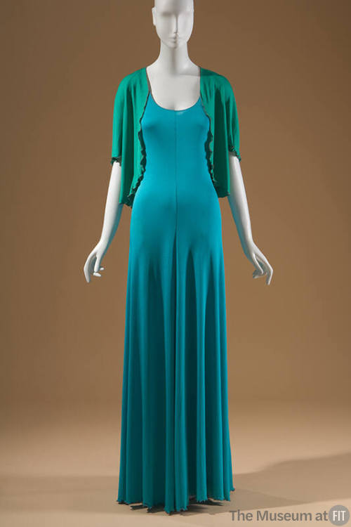 Green short sleeve jacket and blue floor length dress 