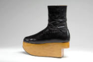 Black leather ankle boot with wood platform heel