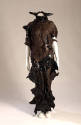 Black crinkle fabric dress with cut outs and shiny rubber details