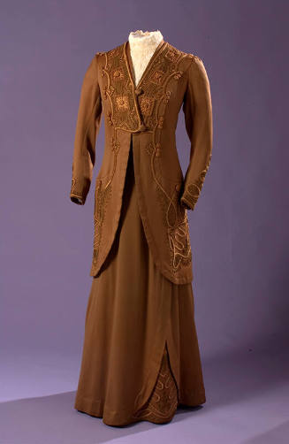 Brown embroidered long sleeve jacket and matching floor length skirt 