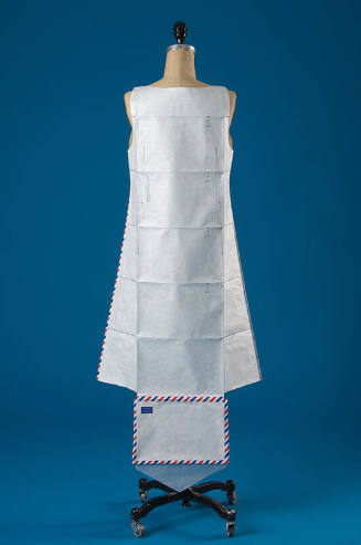 White paper dress made from unfolded air mail envelope with red, white, blue trim 