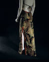 Back view of camouflauge evening dress with back tie and orange zipper trim