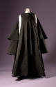 Black long sleeveless evening tent dress with three staggered full circle layers