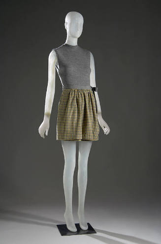 Beach set: heathered grey bathing suit and short grey, yellow, and white check wrap skirt