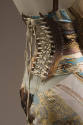 Back view of evening dress and corset printed with design of gilt baroque frames with metallic …
