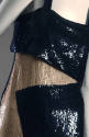 Long tapered black and beige sequined evening sheath with asymmetrical design