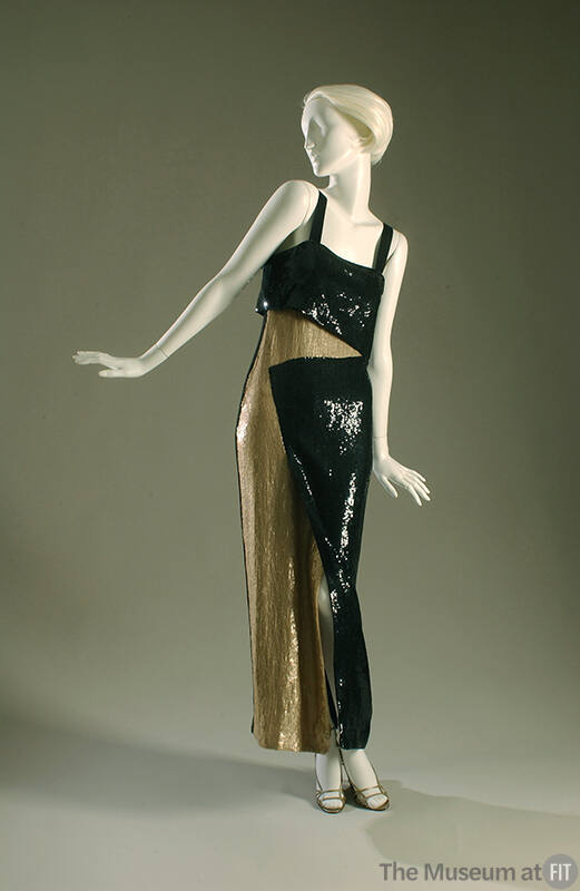 Long, black and beige sequined evening sheath with asymmetrical design