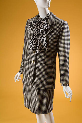 Black and white checkered suit with blazer style jacket and short straight skirt, coordinating …