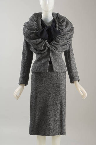 Black and white tweed with black sparkle suit: jacket with wide, voluminous shawl collar; strai…