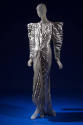 Pleated metallic silver lamé long sleeve dress, futuristic angular styling with wide padded sho…