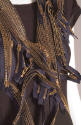 Asymmetrical halter top of multiple gold metal zippers 