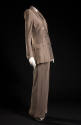 Taupe pantsuit with double breasted jacket with padded shoulders and wide leg cuffed trousers
