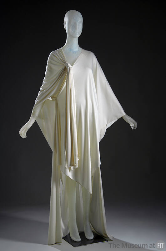 White caftan dress with gathered knotted shoulder and asymmetrical hem