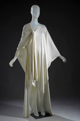 White caftan dress with gathered knotted shoulder and asymmetrical hem