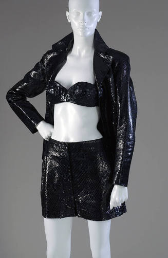 Black snakeskin long sleeve jacket with lapels, matching bra top and shorts