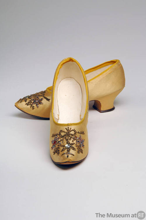 Yellow gold satin pumps with bronze seed beads and rhinestone floral motif 