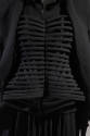 Detail of black cage openwork corset 