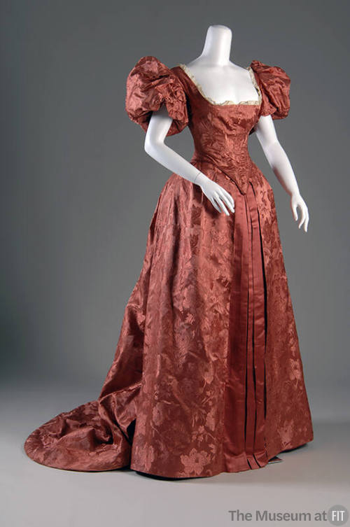 Pink floral patterend silk dress with short puffed sleeves, corset bodice and long skirt with t…